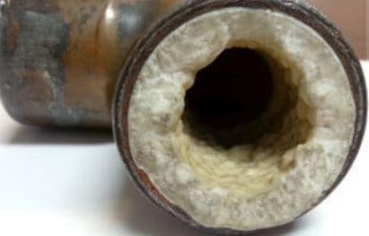 https://watersticks.com/wp-content/uploads/2022/05/Hard-water-builup-inside-pipe.jpg